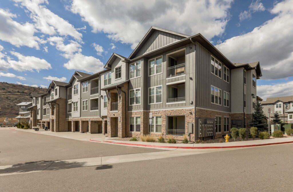 Building exteriors with mountains in the background