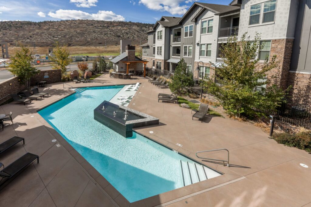 Pool with sundeck and mountain views